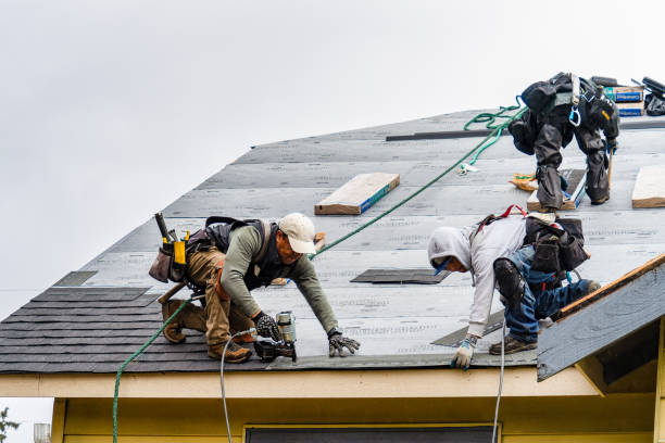 Professional Emergency Roof Repair technician working in Colchester, VT